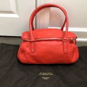 Like new Kate Spade Beautiful leather handbag! Black and white striped interior.